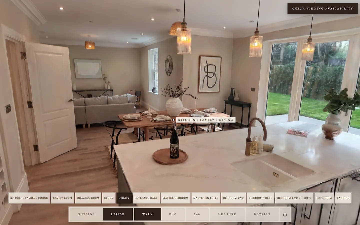 Heathcote's kitchen in the tour: the island, the ovens and the room chips along the bottom
