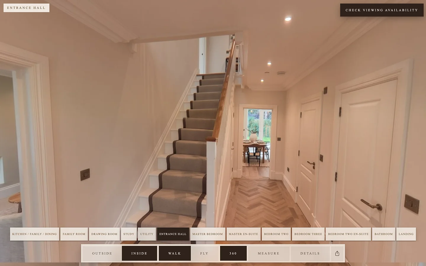 A 360 photo of Heathcote's kitchen and dining area open in the tour on a laptop